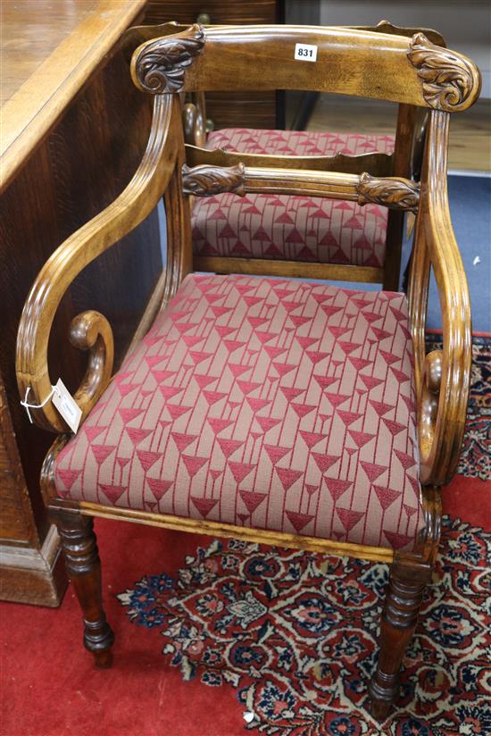 A pair of Regency mahogany open armchairs